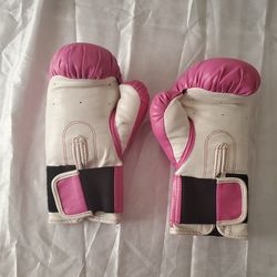 2 pair of pink boxing gloves