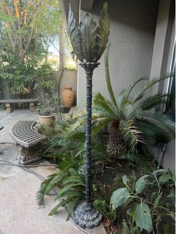 Vintage cast iron metal palm tree torchiere garden lamp.