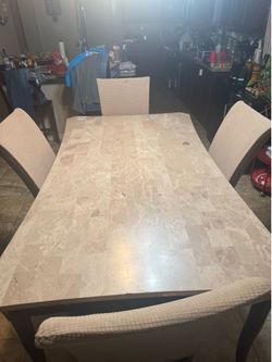 Dinning room Table with four chairs.