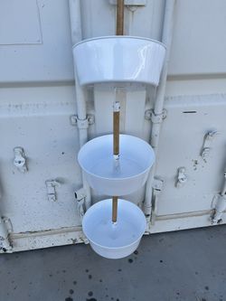 Three hanging plant holders