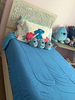 Twin Bed Frame with Carved Headboard
