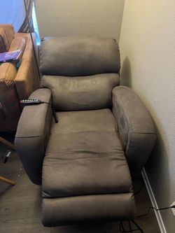 Electric reclining massaging chair
