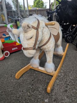 Plush horse rocker rocking