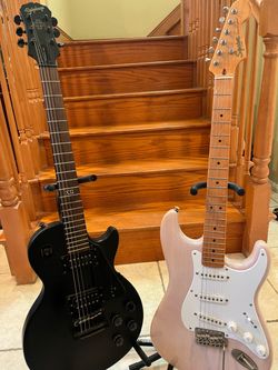 Squier Classic Vibe 50s Stratocaster (Mint) and Epiphone Les Paul Goth
