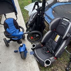 Car Seat, Stroller And A Bike Stroller