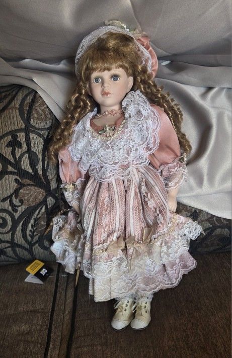 Vintage Porcelain Doll $25
