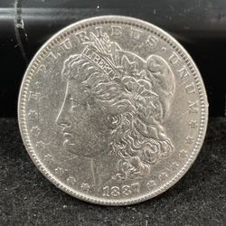 1887 Silver Lightly Circulated Morgan Dollar In Excellent Condition 254