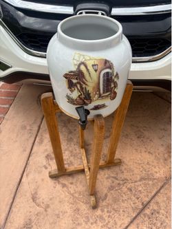 Ceramic water jug holder with stand