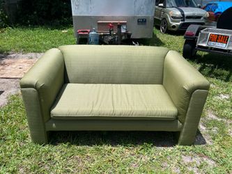 Small green couch loveseat sofa