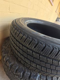 Used tire . 245 / 60 R 18
