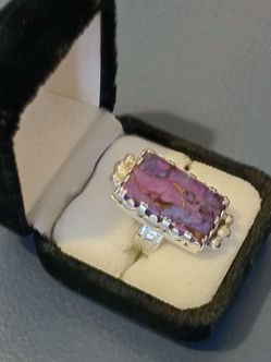 Ring,, sterling silver the stone is purple turquoise
