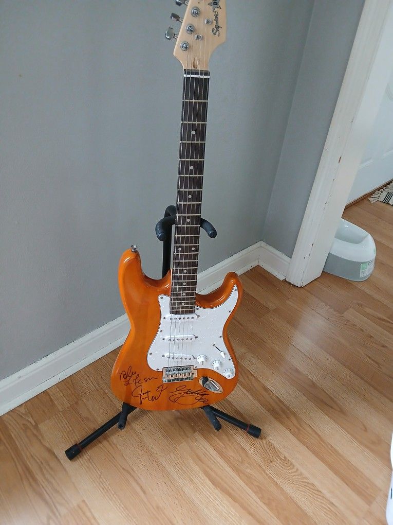 Fender Guitar Supposed To Be Be Signed By RUSH?