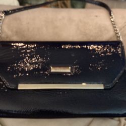 Black purse, shiny