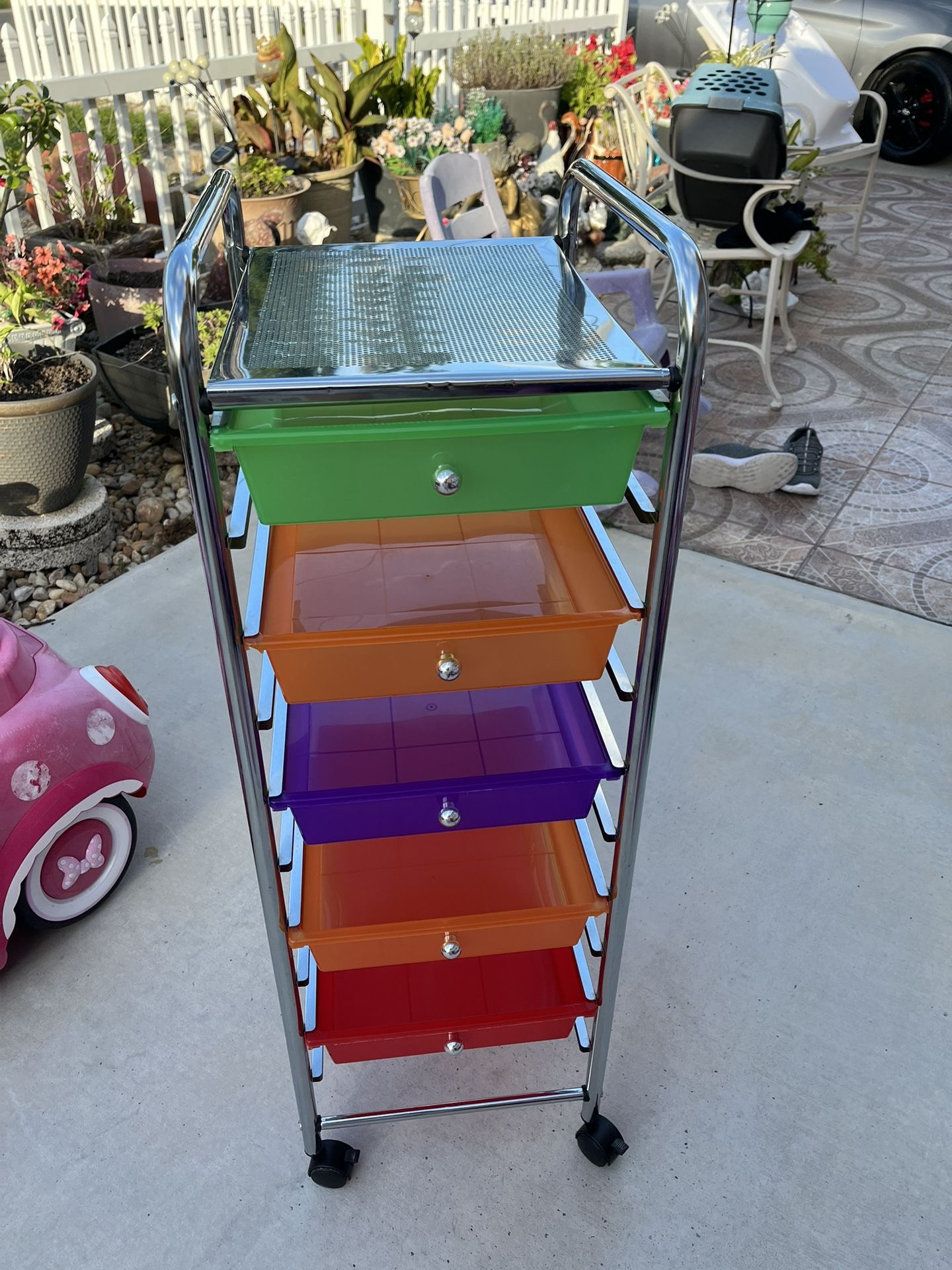 Clean 5-drawer shelf measures 38 inches high, 13 inches wide, and 15 inches long with wheels for easy transport.