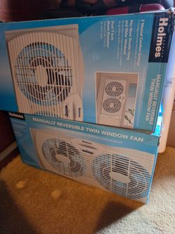 Manually Reversible Twin Window Fans
