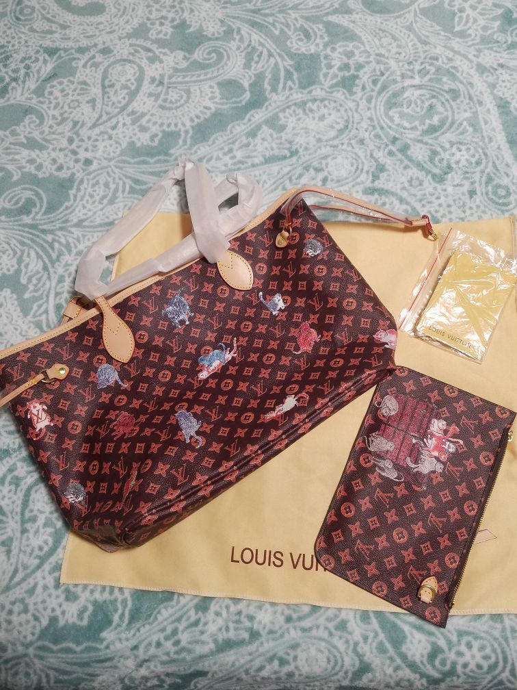 Brand new Louis Vuitton handbag with matching clutch