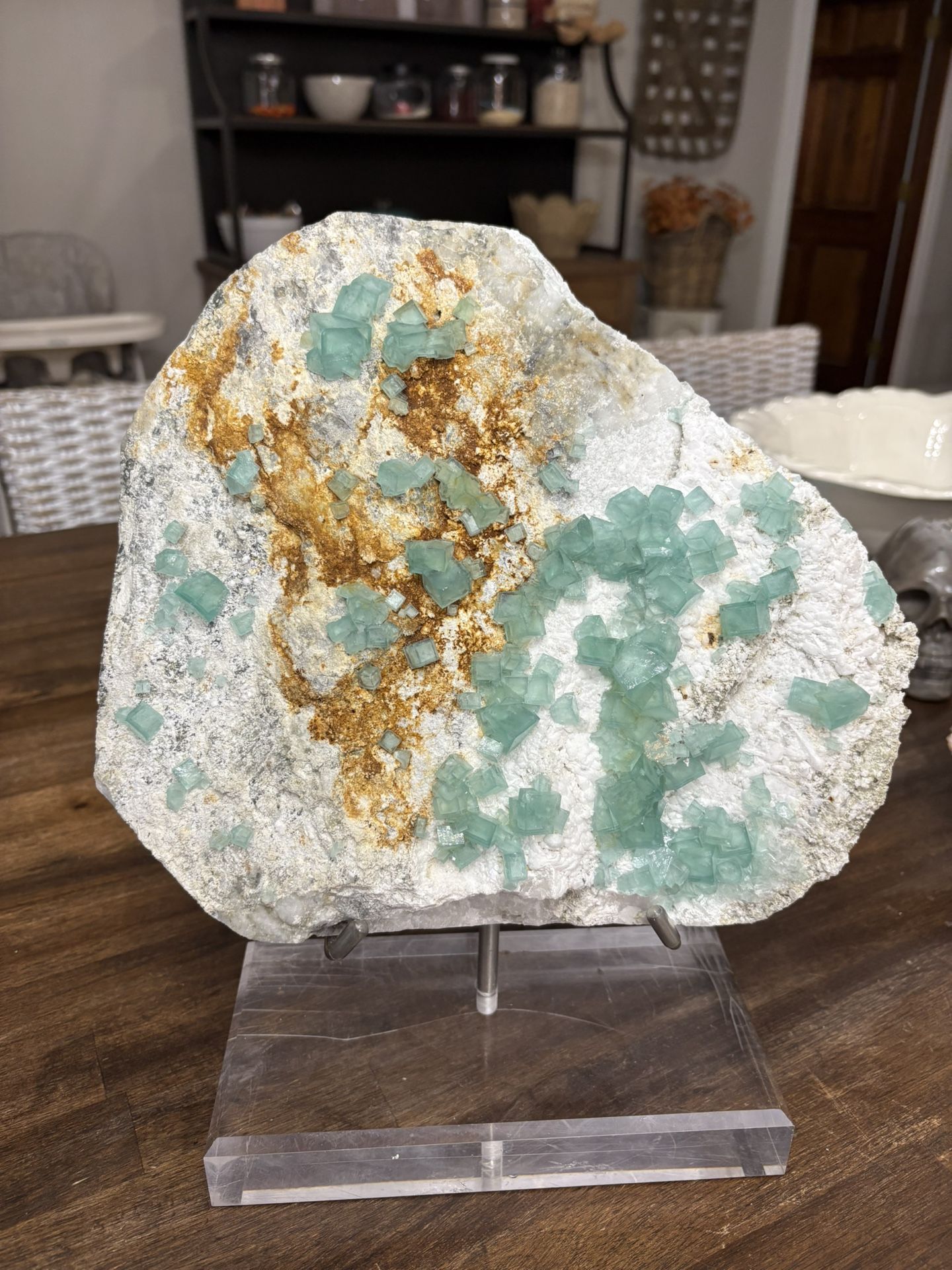 Large raw cubic fluorite on the matrix with stand