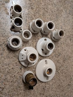 Eleven vintage porcelain fixtures