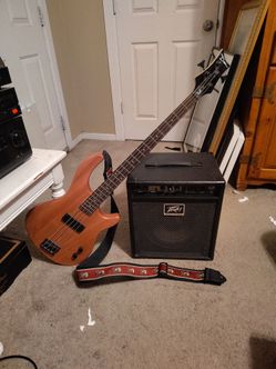 Dean Bass  with Peavey Bass amp and Strap