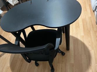 Desk with rolling chair