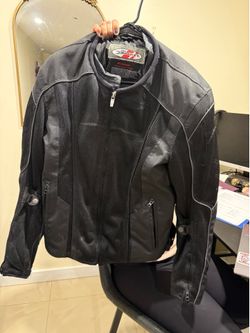 Motorcycle riding jacket with  armor