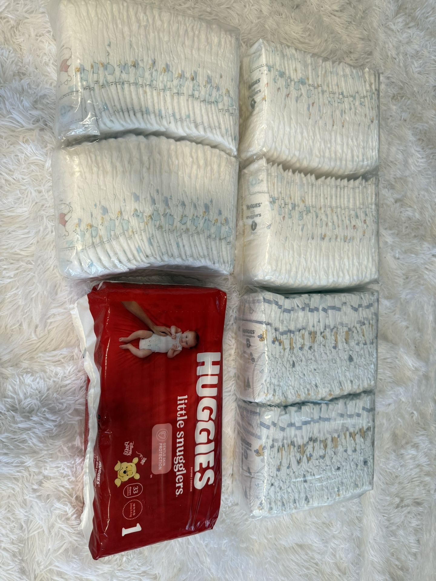 Unopened Huggies size 1 Diapers