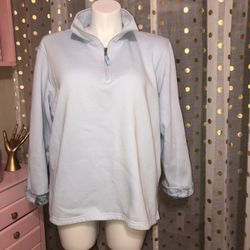 Ms. Lee size 2x light blue top zip sweatshirt with sleeves that cuff to a floral print CHEST:50” LENGTH:27” SLEEVE:22”