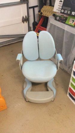 Child’s Swivel Chair on rollers with removable (washable) covers $25
