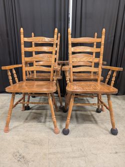 Set of Four Golden Oak Ladderback Dining Chairs with Arms
