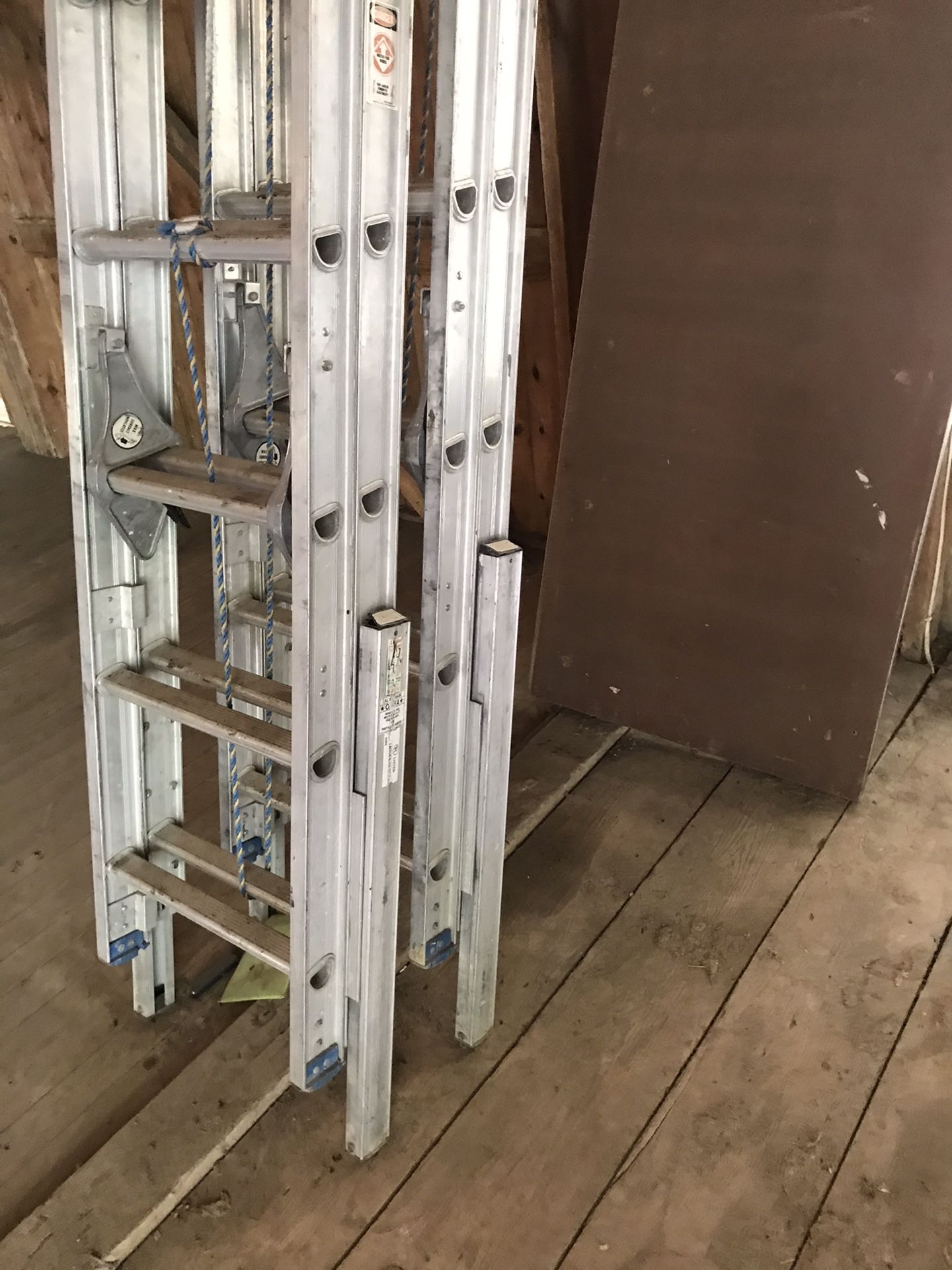 Two 36ft type 1 self leveling aluminum extension ladders