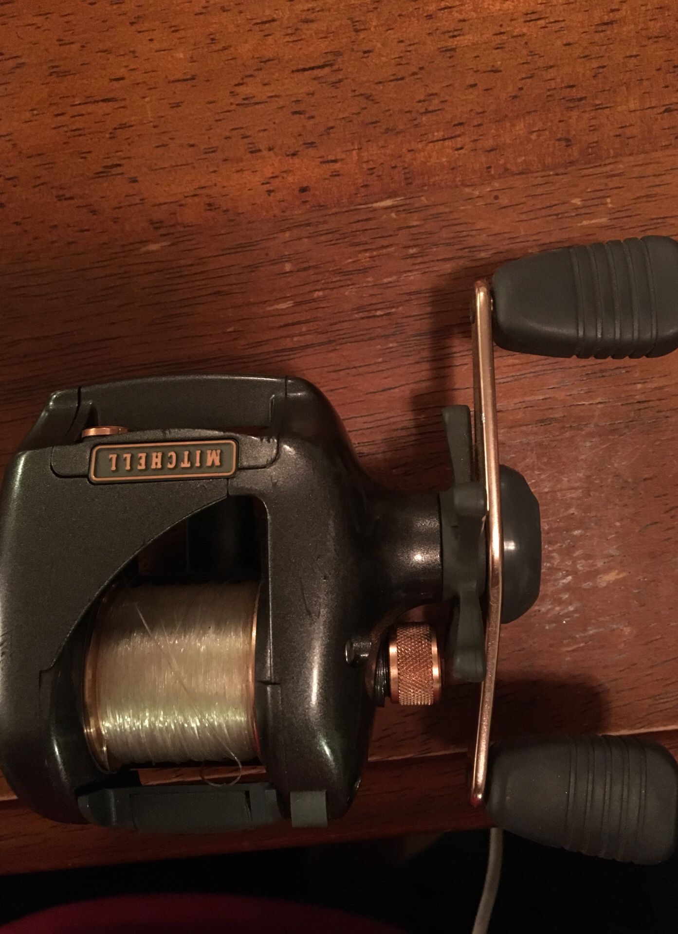 MITCHELL COPPERHEAD 300 RIGHT HAND LEVELWIND BAITCAST REEL for