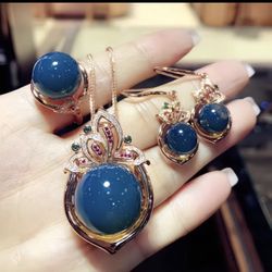 Natural Mexican clear blue amber pendant, earrings, and ring four-piece set (high-end)
