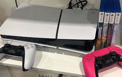 PS5 Slim Console with 2 Controllers and 4 Games