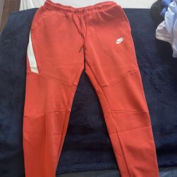Red Nike Tech Fleece Joggers 