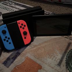 Nintendo Switch Joy-con Neon blue and Red with controller 