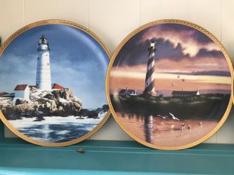 Light house decorated plates with hangers. And shot mugs