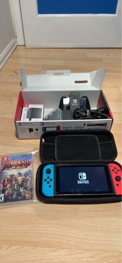 Nintendo switch with jumanji game, new charger, dock, case, game case and box no trades cash only see my other listings for more gaming stuff