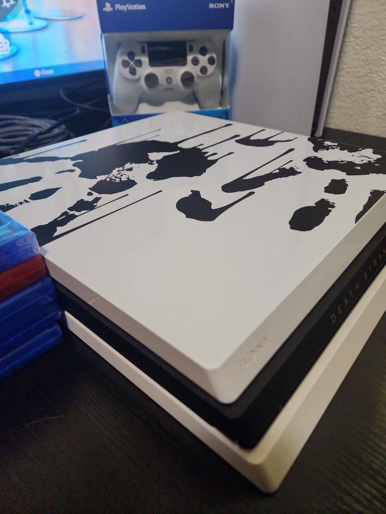 Great Condition Ps4 Pro With Games And New Controller