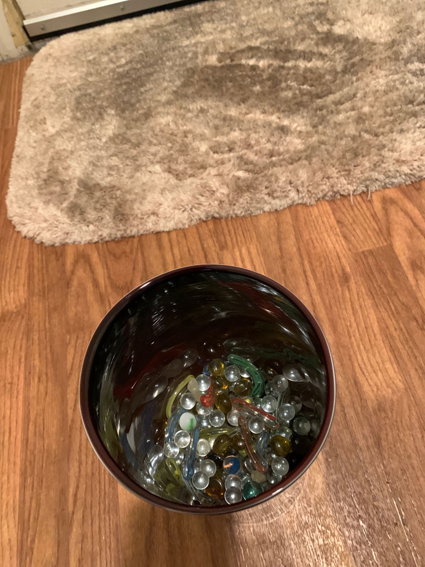 Vase with glass beads and flowers