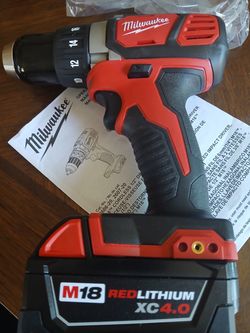 18 v Milwaukee drill drive and  battery 4.0ad new
