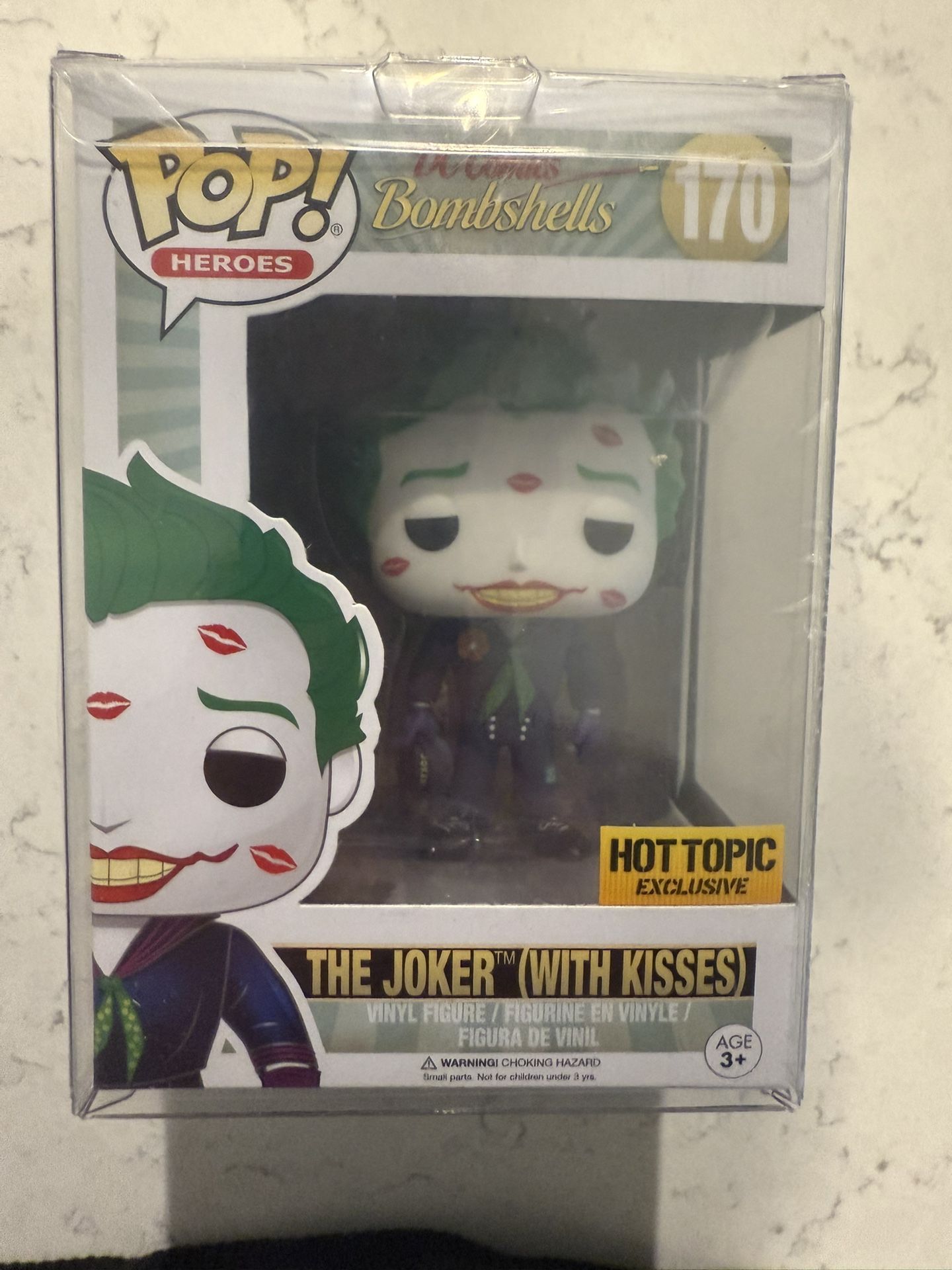 DC Bombshells - The Joker (With Kisses) #170 Hot Topic Exclusive is a standard-sized vinyl figure from 2017