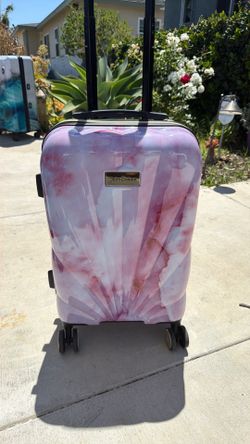 brand new 21” juicy couture luggage