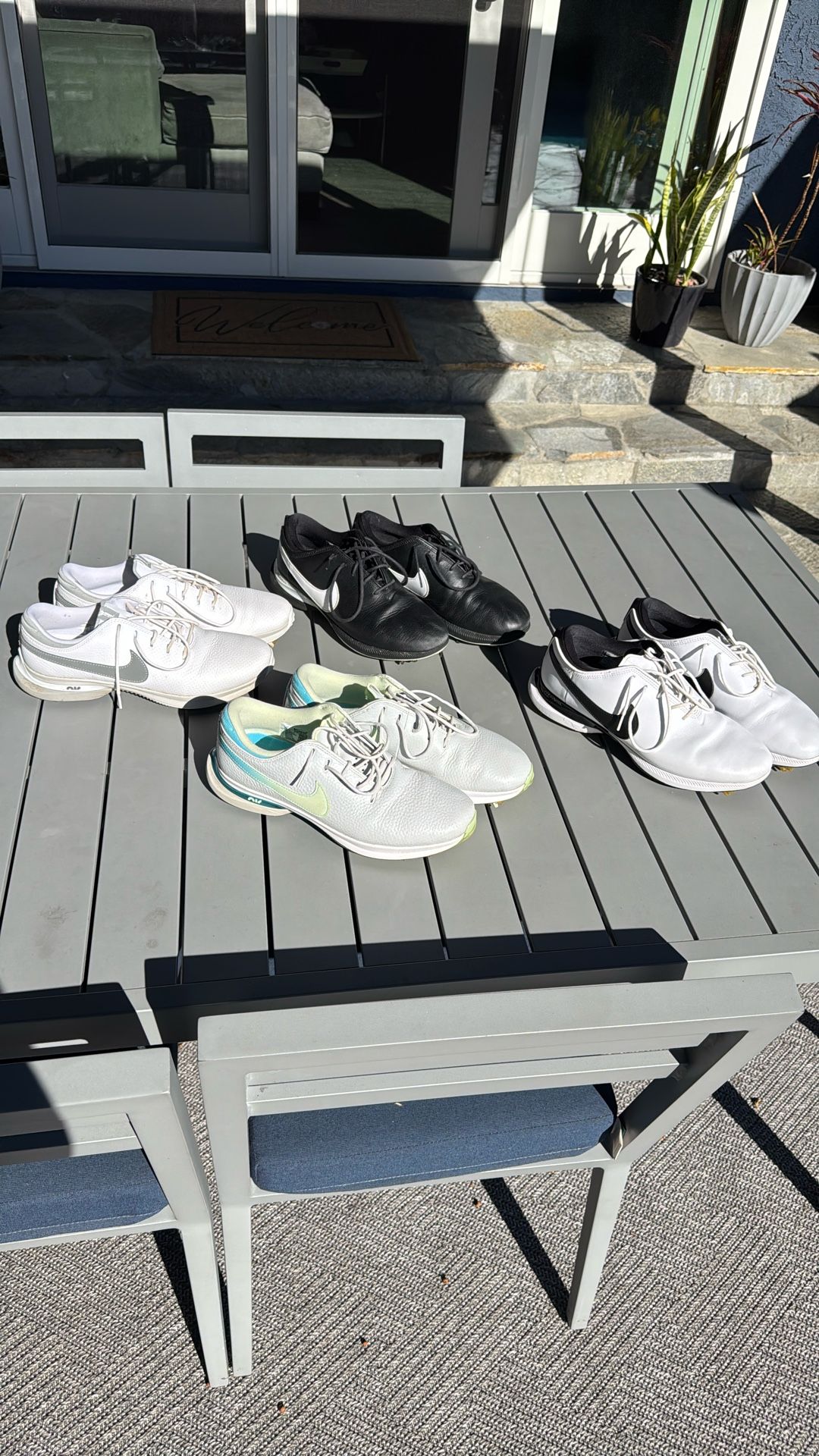 4 pairs of Nike Victory golf shoes