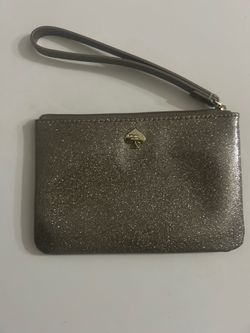 kate spade Silver Glitter Wristlet Clutch with Strap with Gold logo