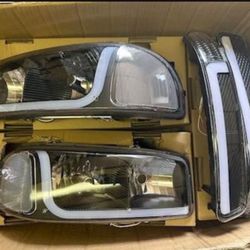 99-06  gmc sierra/ yukon/ yukon xl led sequential turn signal headlights  micas luces faros