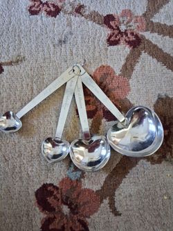 Heart shaped measuring spoons. New