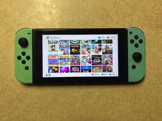 Nintendo Switch with 100 Switch Games + 7500 Retro Games Included
