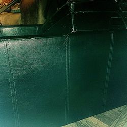 Convertible, black leather storage ottoman with rested stools. Durable last.