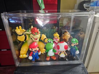 SUPER MARIO TOY COLLECTION IN DISPLAY CASE IN NORWALK