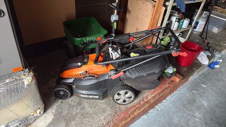 Lawnmower with battery and charger